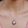 rainbow moonstone rhodolite garnet fire opal and zircon pendant necklace in 18k yellow gold and rhodium over sterling silver worn around the neck