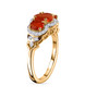 side view of fire opal white and brown zircon halo three stone ring in 18k yellow gold over sterling silver