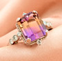 ametrine and moissanite ring in rhodium over sterling silver shown in a lifestyle photo