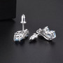 full view of sky blue topaz and white zircon stud earrings in rhodium over sterling silver