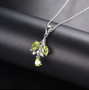 close up of peridot leaf necklace in rhodium over sterling silver