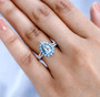 aquamarine turquoise and zircon halo ring in rhodium over sterling silver worn on a hand
