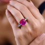 red and purple quartz triplet multi gemstone ring in black and white rhodium over sterling silver worn on a hand