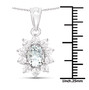aquamarine and white topaz halo jewelry set in rhodium over sterling silver shown for size comparison