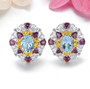 sky blue topaz and multi gemstone cluster stud earrings in rhodium over sterling silver shown in a lifestyle photo