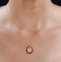 heliodor rhodolite garnet and moissanite halo pendant necklace in 18k rose gold over sterling silver worn around the neck