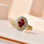 pink tourmaline yellow and white diamond halo ring in 14k yellow gold shown in a lifestyle photo