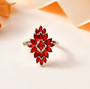 fire opal cluster ring in rhodium over sterling silver shown in a lifestyle photo