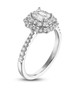 emerald and round diamond double halo wedding ring in 14k yellow gold