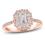 full view of emerald and round diamond double halo wedding ring in 14k yellow gold