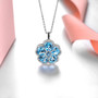 close up of swiss blue topaz and white zircon flower necklace in rhodium over sterling silver