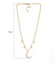 moissanite moon station necklace in 18k yellow gold over sterling silver shown for size comparison