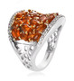 side view of orange kyanite and white zircon wide band cluster ring in rhodium and 18k yellow gold over sterling silver