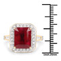 ruby (ff) emerald cut and white diamond halo ring in solid 14k yellow gold shown for size comparison