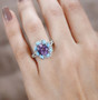 rose de france amethyst turquoise and white zircon halo ring in rhodium over sterling silver worn on a hand