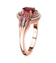side view of rubellite tourmaline pink sapphire and moissanite ring in 18k rose gold over sterling silver
