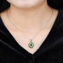 chrome diopside and white zircon double halo pendant necklace in rhodium over sterling silver worn around the neck