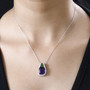 amethyst chrome diopside and moissanite pendant necklace in rhodium over sterling silver worn around the neck