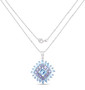 full view of sky blue topaz and tanzanite double halo pendant necklace in rhodium over sterling silver