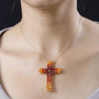 colors of fire opal cross pendant necklace in 18k yellow gold over sterling silver worn around the neck