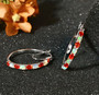 ethiopian opal and fire opal hoop earrings in rhodium over sterling silver shown in a lifestyle photo