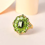 peridot and black spinel ring in 18k yellow gold and rhodium over sterling silver shown in a lifestyle photo