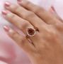 madeira citrine fire opal and white zircon pear halo ring in 18k yellow gold over sterling silver worn on a hand