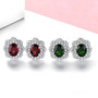 close up of rhodolite garnet and white zircon double halo stud earrings in rhodium over sterling silver