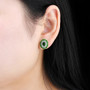 chrome diopside and white zircon double halo stud earrings in rhodium over sterling silver worn on the ear