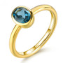london blue topaz oval bezel set solitaire ring in 18k yellow gold over sterling silver