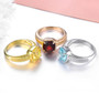 close up of garnet 8mm square cushion solitaire ring in 18k rose gold over sterling silver