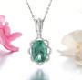 green fluorite and white zircon halo pendant necklace in rhodium over sterling silver shown in a lifestyle photo