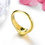 back view of peridot 6mm heart bezel solitaire ring in 18k yellow gold over sterling silver