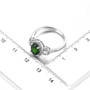chrome diopside and white zircon halo ring in rhodium over sterling silver shown for size comparison
