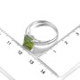 peridot and white zircon ring in rhodium over sterling silver shown for size comparison