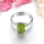 front view of peridot and white zircon ring in rhodium over sterling silver