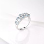 close up of aquamarine oval band ring in rhodium over sterling silver