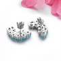back view of blue topaz citrine and white zircon earrings in rhodium over sterling silver