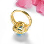 back view of swiss blue topaz and white zircon double halo ring in 18k yellow gold over sterling silver