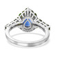 back view of blue kyanite and chrome diopside halo ring in rhodium over sterling silver