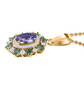 side view of tanzanite pink tourmaline and white zircon halo pendant necklace in 18k yellow gold over sterling silver