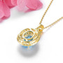 back view of swiss blue topaz and white zircon double halo pendant necklace in 18k yellow gold over sterling silver