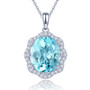 sky blue topaz and white zircon halo pendant necklace in rhodium over sterling silver