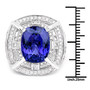 tanzanite and white diamond double halo ring in 18k white gold shown for size comparison