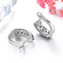 back view of garnet and white zircon hoop earrings in rhodium over sterling silver