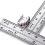 garnet and white zircon hoop earrings in rhodium over sterling silver shown for size comparison