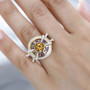 citrine multi gemstone cluster ring in 18k yellow gold over sterling silver worn on a hand