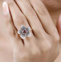 pink apatite pink sapphire brown zircon and white zircon flower cluster ring in 18k rose gold over sterling silver worn on a hand
