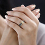 heliodor brown zircon and white zircon ring in 18k yellow gold over sterling silver worn on a hand