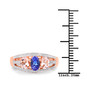 tanzanite and morganite trilogy band ring in two-tone 14k rose gold over sterling silver shown for size comparison